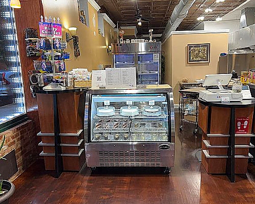 Inside of store with view of cakes showcasing oreo tres leches.