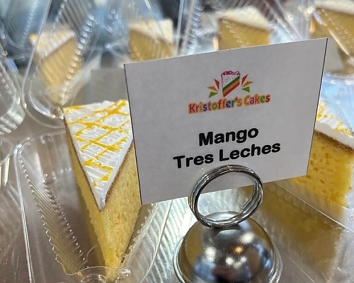 Mango tres leches cake showcasing tres leches cake.