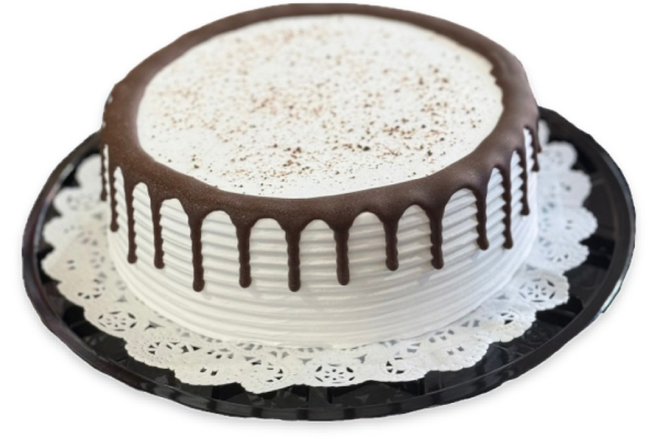 A chocolate cake with frosting on top showcasing cake delivery.